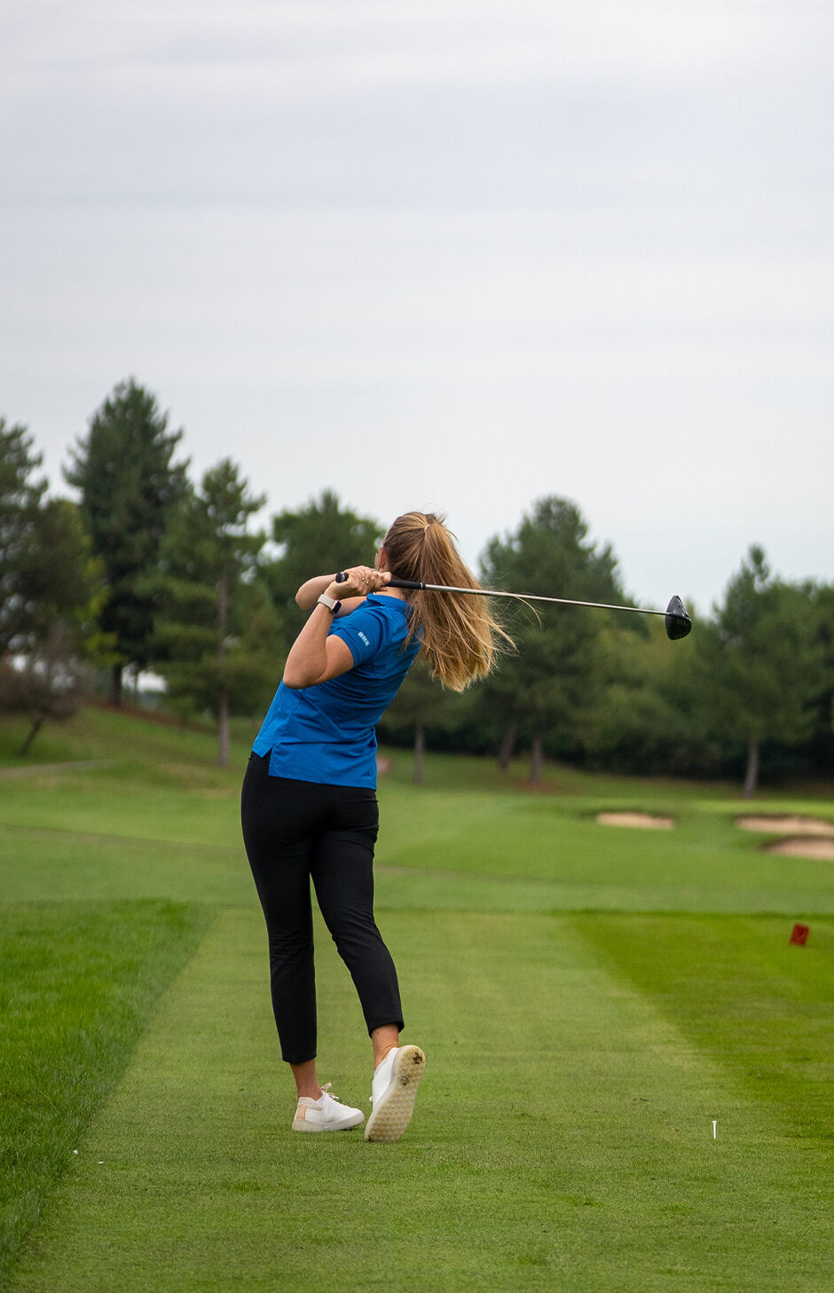 Golfer Teeing Off